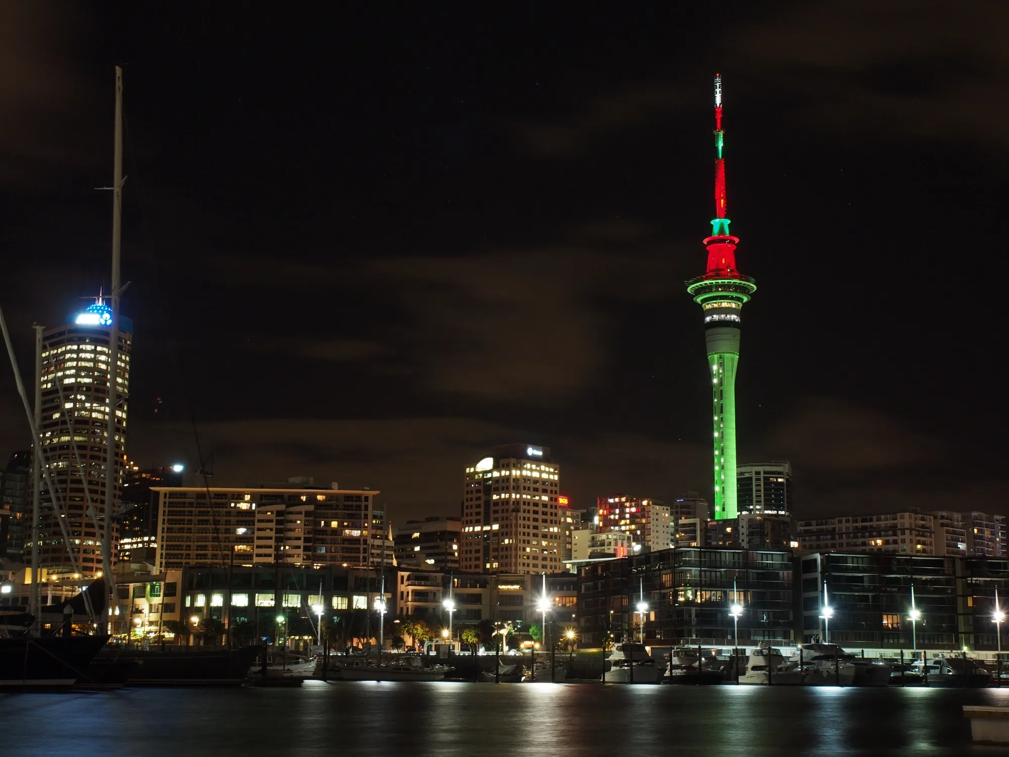 Auckland’s Sky Tower and waterfront at night