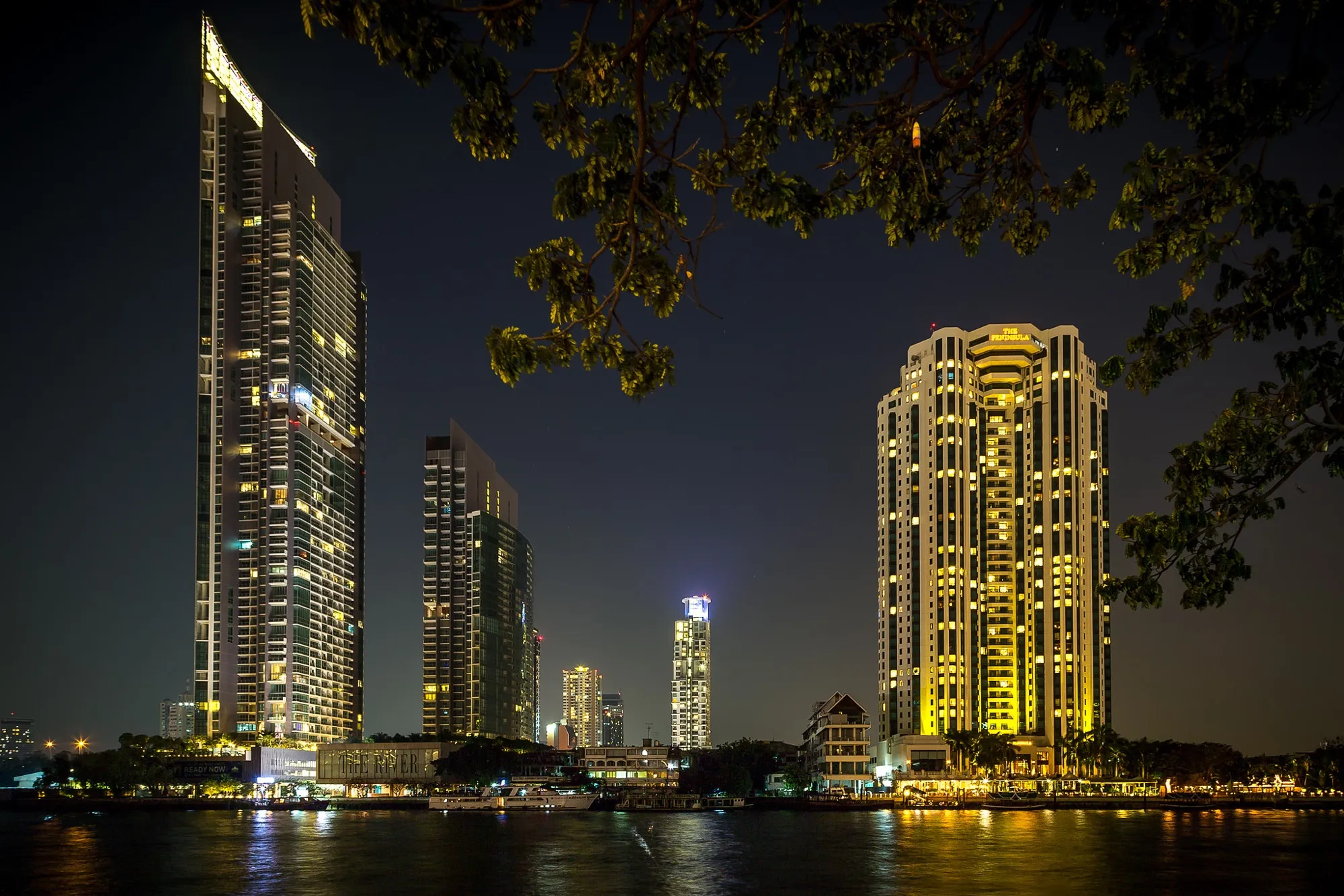 Bangkok skyline along the Chao Phraya River at night