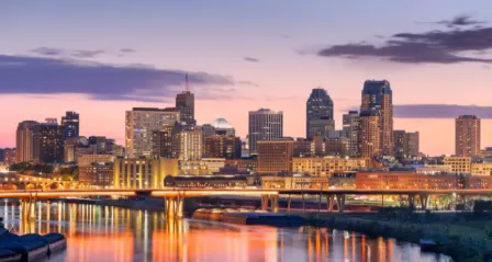 Skyline of downtown Minneapolis at sunset along the Mississippi River