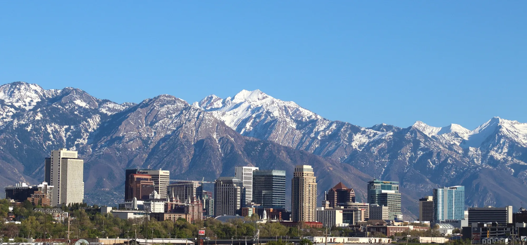 Downtown Salt Lake City with the snow-covered Wasatch Mountains behind
